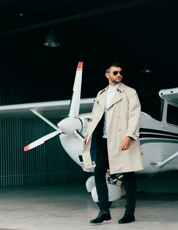 Chauffeur greeting private jet passenger at New Orleans FBO